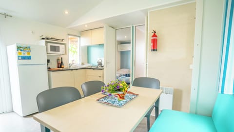 Premium Mobile Home, 3 Bedrooms | Private kitchenette | Full-size fridge, microwave, stovetop, cookware/dishes/utensils