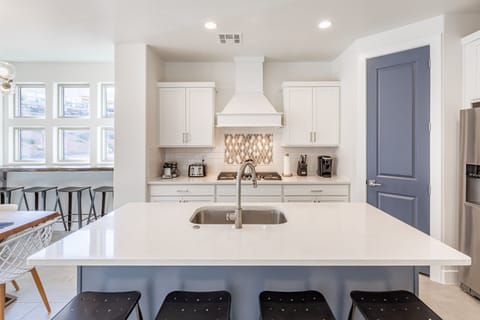 Kitchen - The kitchen is fully stocked with all the dishes, cookware, baking pans, and cutlery you will need for meal preparations and includes stainless steel appliances and granite counter tops.