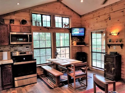 Dining Area, Kitchen, 12' Vaulted Ceiling with beautiful Hill Country Views.
