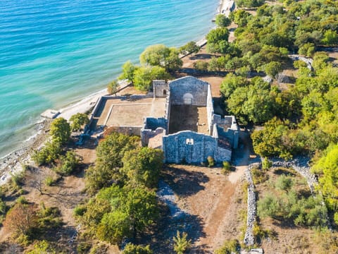 Water, Plant, Property, Building, Azure, Tree, Body Of Water, Natural Landscape, Beach, Landscape