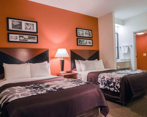 Pillowtop beds, desk, laptop workspace, blackout drapes