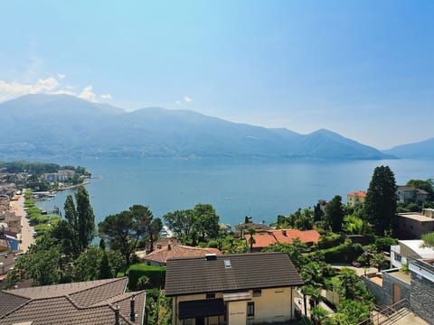 Sky, Mountain, Hill Station, Mountainous Landforms, Wilderness, Town, Roof, Property, Mountain Range, Hill