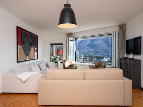 Furniture, Interior Design, Couch, Flooring, Floor, Living Room, Room, Ceiling, Table, Apartment