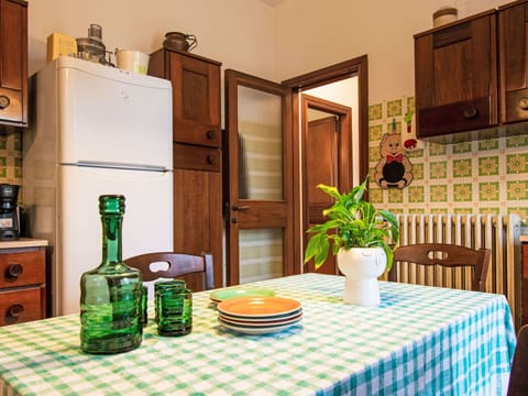 Furniture, Flooring, Interior Design, Wood, Kitchen, Floor, Countertop, Cabinetry, Kitchen Appliance, Major Appliance