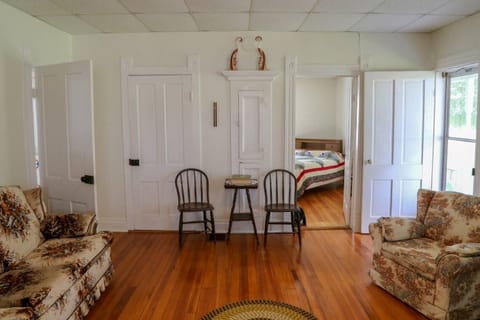 Spacious 1st floor Living Room with beautiful hardwood floors.