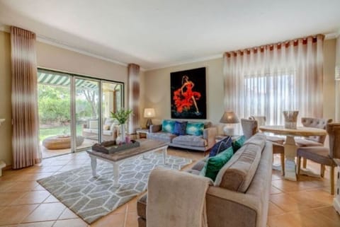 Spacious south facing lounge overlooking terrace and the garden 