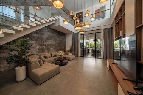 Four Bedroom Private Pool Family Villa - Beer Included | Living area | 29-inch TV with cable channels