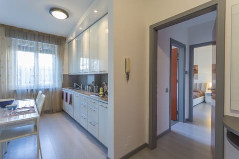 Apartment, 1 Bedroom | Private kitchenette | Full-size fridge, microwave, stovetop, dishwasher