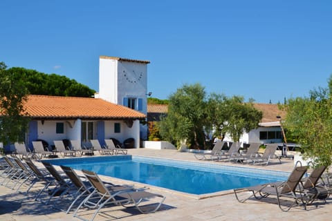 Outdoor pool, open 9:00 AM to 9:00 PM, sun loungers