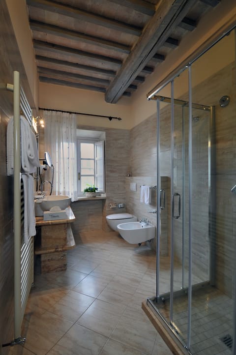 Shower, free toiletries, hair dryer, towels