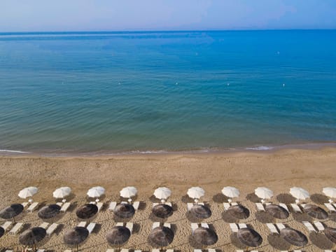 Sun loungers, beach umbrellas, beach towels