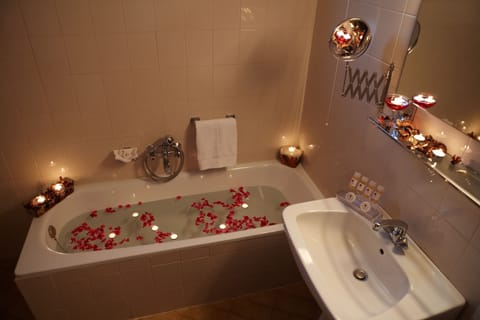 Suite | Bathroom | Hair dryer, bathrobes, slippers, towels