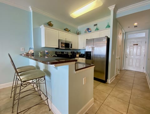 Condo, 2 Bedrooms, Balcony, Beachfront (P403) | Private kitchen | Full-size fridge, microwave, oven, stovetop