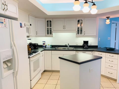 Condo, 3 Bedrooms, Balcony, Beachfront (1104A) | Private kitchen | Full-size fridge, microwave, oven, stovetop