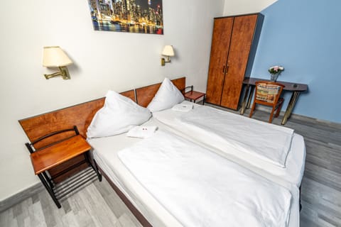 Desk, free WiFi, bed sheets