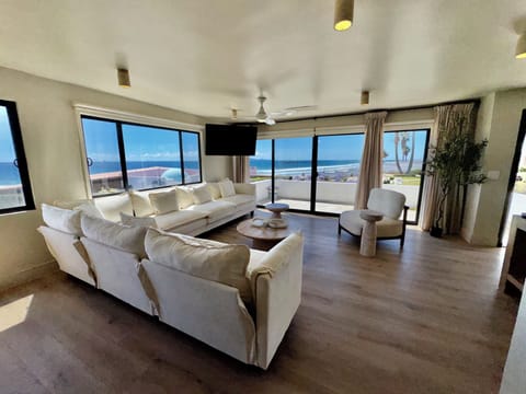     Elegant open-concept living room featuring breathtaking ocean views 