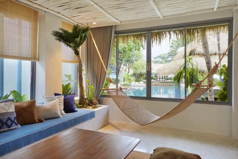 Two Bedroom Family Suite | Living area | 50-inch LCD TV with cable channels, TV
