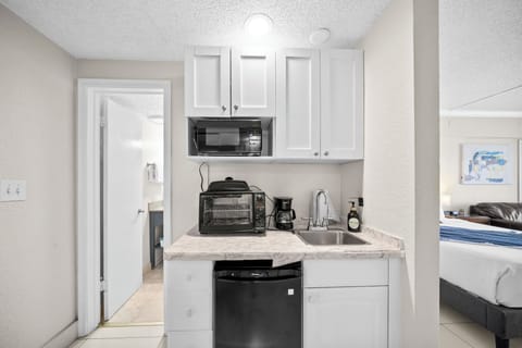 Fridge, microwave, coffee/tea maker, electric kettle