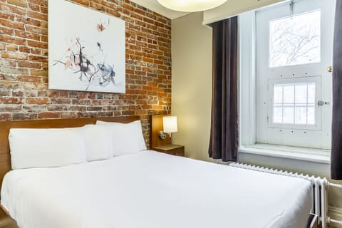 Economy Plus Room | Desk, blackout drapes, iron/ironing board, free WiFi