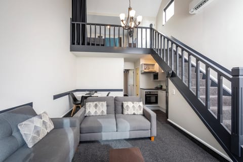Suite, 2 Bedrooms | Living area | LCD TV, DVD player