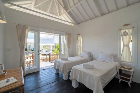 Deluxe Twin Room, Garden View | In-room safe, desk, soundproofing, free cribs/infant beds