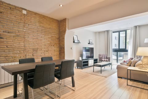 Apartment, 1 Bedroom | Living area | Flat-screen TV