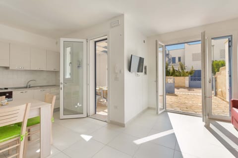 Comfort House, 2 Bedrooms | Living area | Flat-screen TV