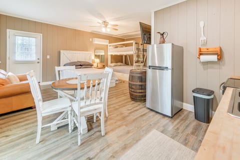 Hideaway studio with 3 queens; kitchenette and private bath/shower.