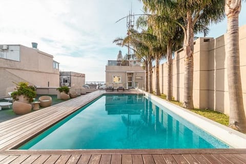 Outdoor pool, open 8 AM to 11 PM, sun loungers