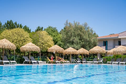 Seasonal outdoor pool, pool umbrellas, sun loungers