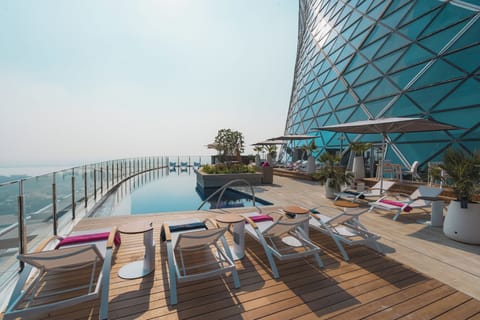 Outdoor pool, pool umbrellas, sun loungers