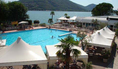 Outdoor pool, open 9:30 AM to 7:30 PM, pool umbrellas, sun loungers