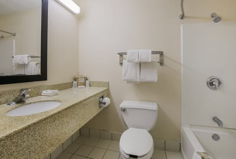 Superior Room, 1 King Bed, Non Smoking | Bathroom | Combined shower/tub, hair dryer, towels