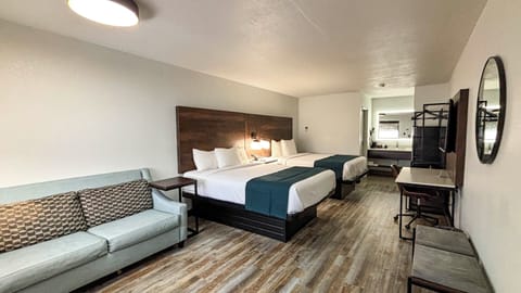 Down comforters, pillowtop beds, desk, laptop workspace