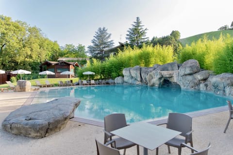 Outdoor pool, pool umbrellas, sun loungers