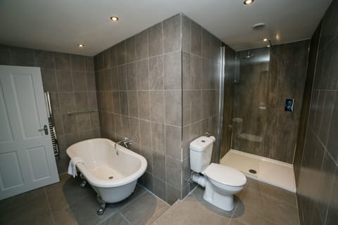 Suite | Bathroom | Designer toiletries, hair dryer, towels