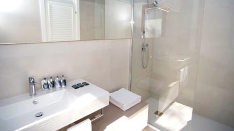 Deluxe Villa, 2 Bedrooms, Kitchenette, Garden Area | Bathroom | Shower, rainfall showerhead, free toiletries, hair dryer