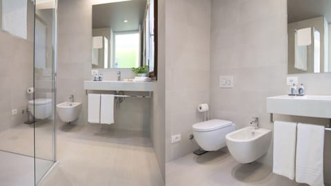 Deluxe Villa, 2 Bedrooms, Kitchenette, Garden Area | Bathroom | Shower, rainfall showerhead, free toiletries, hair dryer