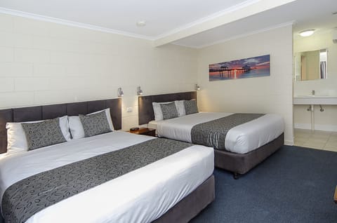 Standard Double Queen Room  | Desk, blackout drapes, iron/ironing board, free WiFi