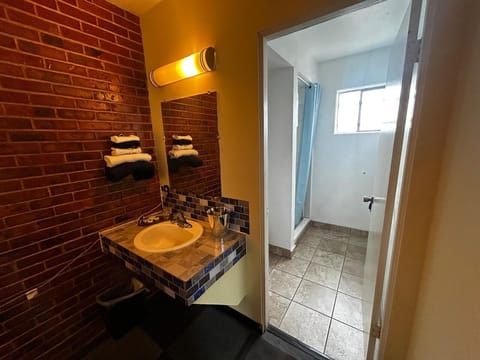 Room, 2 Queen Beds, Non Smoking | Bathroom | Free toiletries, hair dryer, towels