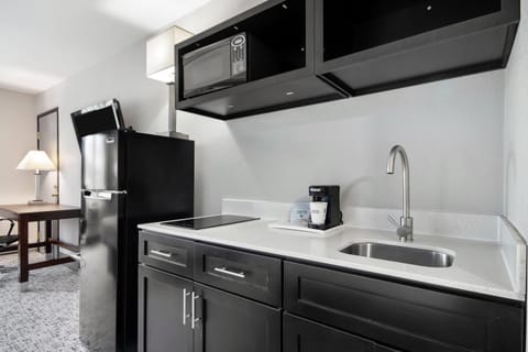 Room, 2 Double Beds, Non Smoking, Kitchen | In-room safe, desk, iron/ironing board, free cribs/infant beds