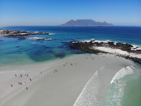 Beach nearby, white sand, beach towels