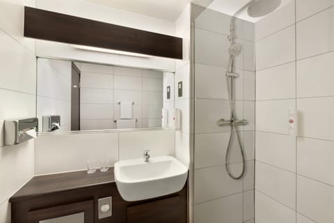 Comfort Room, Non Smoking | Bathroom | Eco-friendly toiletries, hair dryer, towels