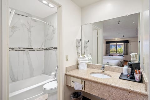 Combined shower/tub, eco-friendly toiletries, hair dryer, towels