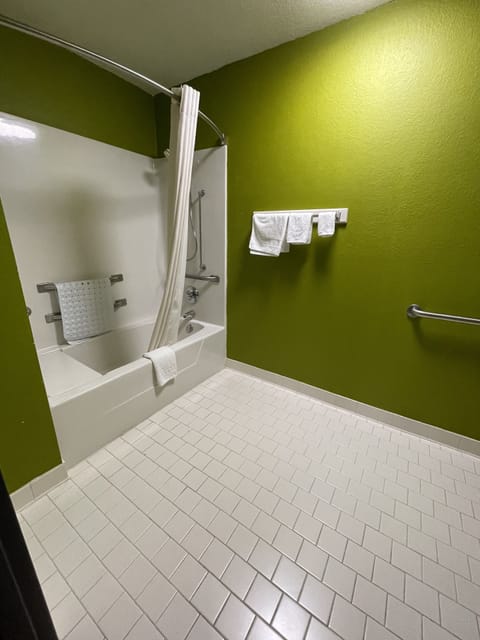 Room, 1 King Bed, Accessible | Bathroom | Combined shower/tub, free toiletries, hair dryer, towels
