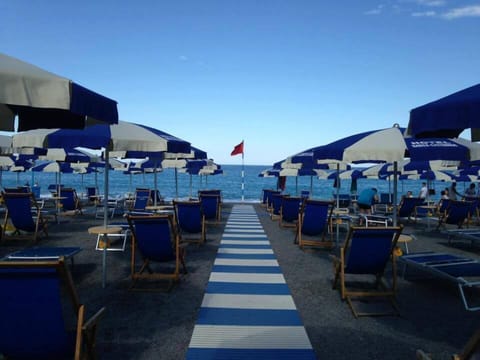 On the beach, sun loungers, beach umbrellas, beach volleyball