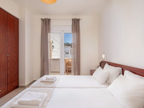 Deluxe Apartment, Pool View | Hypo-allergenic bedding, in-room safe, desk, blackout drapes