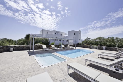 Outdoor pool, pool umbrellas, sun loungers