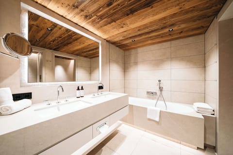 Panoramic Double Room, Mountain View | Bathroom | Designer toiletries, hair dryer, bathrobes, slippers