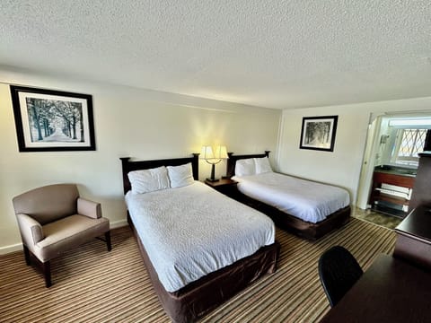 Desk, blackout drapes, iron/ironing board, free WiFi